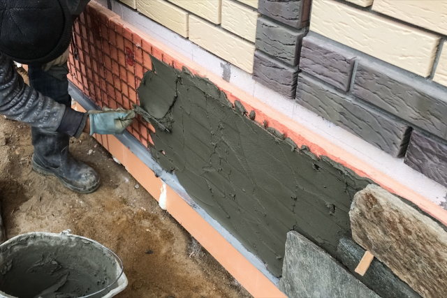 Brick Veneer Laying by worker