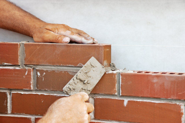 Worker Brick Laying In Eugene